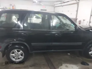 2000 Honda CR-V EX with VIN JHLRD1865YS007202, listed as a IAAI auction lot 41801108 with 134,387 mi miles. Bid and sale history available at carsss.com. Image 13.