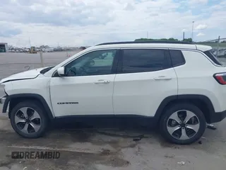 2018 Jeep Compass Altitude with VIN 3C4NJDBB4JT232968, listed as a IAAI auction lot 42388364 with 89,942 mi miles and . Bid and sale history available at DreamBid. Image 14.