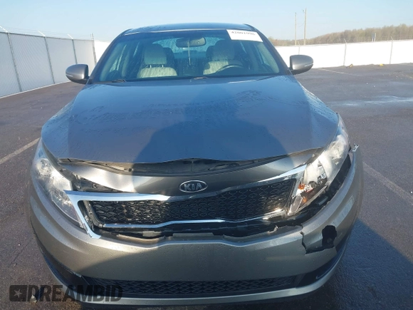 2013 Kia Optima EX with VIN 5XXGN4A77DG101902, listed as a IAAI auction lot 42001996 with 143,469 mi miles and . Bid and sale history available at DreamBid. Image 6.