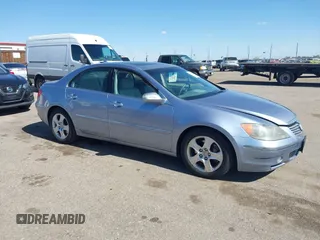2005 Acura RL with VIN JH4KB16555C008420, listed as a IAAI auction lot 41795049 with 151,000 mi miles. Bid and sale history available at carsss.com. Image 1.