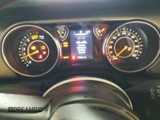 2023 Jeep Wrangler Sport S with VIN 1C4HJXDG0PW670641, listed as a Copart auction lot 41623195 with 27,266 mi miles and Salvage Title. Bid and sale history available at DreamBid. Image 9.