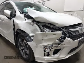 2019 Honda Odyssey Touring with VIN 5FNRL6H8XKB079113, listed as a IAAI auction lot 42359455 with 74,545 mi miles and . Bid and sale history available at DreamBid. Image 6.