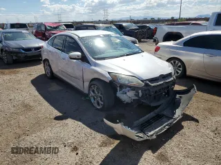 2014 Ford Focus Titanium with VIN 1FADP3J26EL132223, listed as a Copart auction lot 71490004 with 131,233 mi miles and Salvage Title. Bid and sale history available at DreamBid. Image 4.