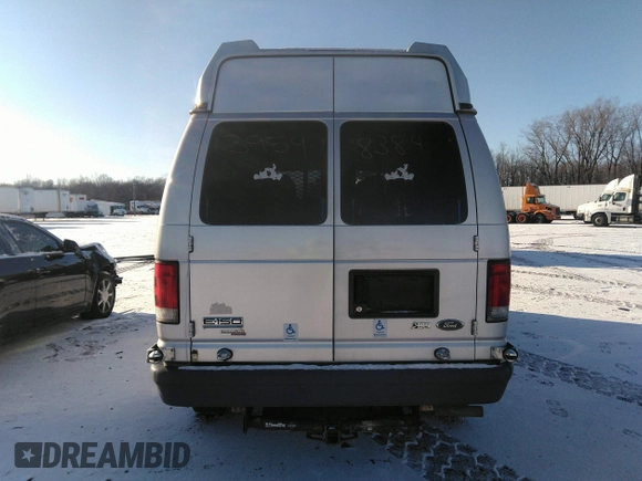 2012 Ford Econoline Passenger XL z VIN 1FMNE1BW4CDA93080, wystawiony jako IAAI lot #41103198 z przebiegiem Nie podano mil oraz . Historia ofert i sprzedaży dostępna na DreamBid. Obrazek 16.