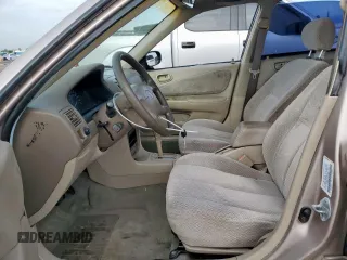 1999 Toyota Corolla VE z VIN 1NXBR12E0XZ215258, wystawiony jako Copart lot #60704095 z przebiegiem Nie podano mil oraz Szkoda całkowita • Salvage title. Historia ofert i sprzedaży dostępna na DreamBid. Obrazek 7.