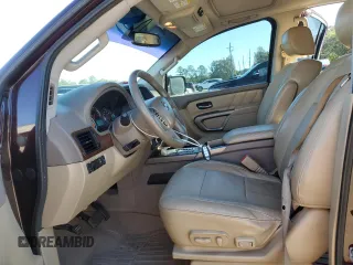 2015 Nissan Armada Platinum z VIN 5N1BA0NF2FN602165, wystawiony jako Copart lot #81283414 z przebiegiem Nie podano mil oraz Szkoda całkowita • Salvage title. Historia ofert i sprzedaży dostępna na DreamBid. Obrazek 7.