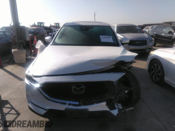 2018 Mazda CX-5 Grand Touring with VIN JM3KFADM4J0309540, listed as a IAAI auction lot 41868480 with 89,110 mi miles. Bid and sale history available at carsss.com. Image 13.