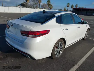 2016 Kia Optima SXL Turbo with VIN 5XXGV4L20GG023095, listed as a IAAI auction lot 41580598 with 155,002 mi miles. Bid and sale history available at carsss.com. Image 4.