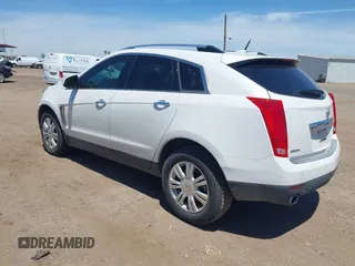 2013 Cadillac SRX Luxury Collection with VIN 3GYFNCE38DS580168, listed as a IAAI auction lot 42122314 with 136,814 mi miles. Bid and sale history available at carsss.com. Image 3.