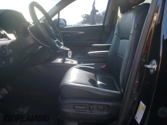 2019 Honda Pilot EX-L with VIN 5FNYF5H57KB025111, listed as a Copart auction lot 53779434 with 86,609 mi miles and Salvage title. Bid and sale history available at DreamBid. Image 7.