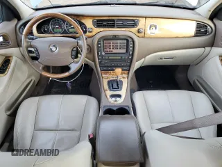 2005 Jaguar S-Type z VIN SAJWA01T45FN51425, wystawiony jako Copart lot #86682684 z przebiegiem 53 218 mil mil oraz Czysty tytuł • Clean title. Historia ofert i sprzedaży dostępna na DreamBid. Obrazek 8.