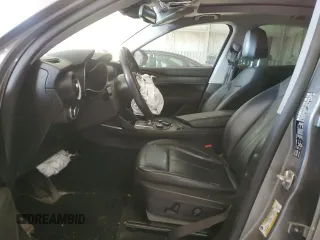 2018 Alfa Romeo Stelvio Ti z VIN ZASFAKBNXJ7B80163, wystawiony jako Copart lot #41805085 z przebiegiem Nie podano mil oraz Szkody całkowita. Historia ofert i sprzedaży dostępna na DreamBid. Obrazek 7.