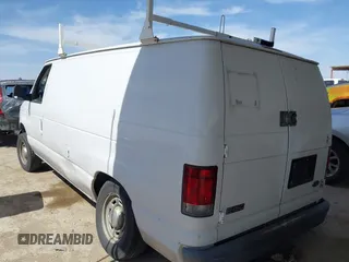 2004 Ford Econoline Cargo with VIN 1FTRE14W44HA29084, listed as a IAAI auction lot 41793350 with 123,429 mi miles. Bid and sale history available at carsss.com. Image 3.