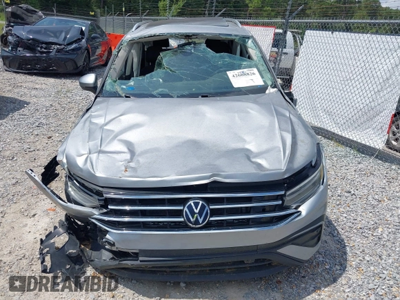 2022 Volkswagen Tiguan SE z VIN 3VV3B7AXXNM167936, wystawiony jako IAAI lot #42608826 z przebiegiem Nie podano mil oraz . Historia ofert i sprzedaży dostępna na DreamBid. Obrazek 11.