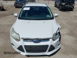 2013 Ford Focus SE with VIN 1FADP3F23DL218239, listed as a IAAI auction lot 42331440 with 156,501 mi miles and . Bid and sale history available at DreamBid. Image 13.