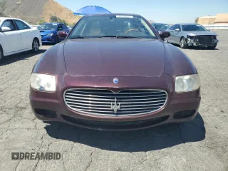 2006 Maserati Quattroporte z VIN ZAMCE39A460022373, wystawiony jako Copart lot #56416065 z przebiegiem 94 251 mil mil oraz Tytuł czysty. Historia ofert i sprzedaży dostępna na DreamBid. Obrazek 5.