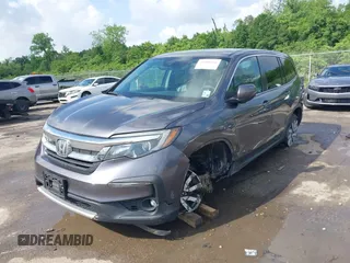 2019 Honda Pilot EX-L with VIN 5FNYF5H52KB039336, listed as a IAAI auction lot 42108456 with 220,307 mi miles and . Bid and sale history available at carsss.com. Image 2.