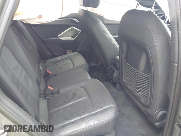 2020 Audi Q3 Premium z VIN WA1AECF30L1052472, wystawiony jako IAAI lot #41886809 z przebiegiem 101 600 mil mil oraz . Historia ofert i sprzedaży dostępna na DreamBid. Obrazek 8.