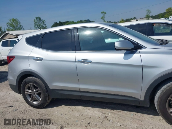 2018 Hyundai Santa Fe 2.4L z VIN 5XYZTDLB9JG513584, wystawiony jako IAAI lot #42031291 z przebiegiem 131 109 mil mil oraz . Historia ofert i sprzedaży dostępna na DreamBid. Obrazek 13.