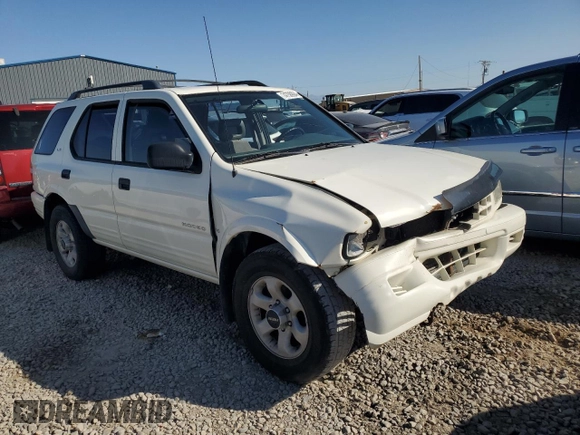 1999 Isuzu Rodeo S with VIN 4S2CM58W0X4306727, listed as a Copart auction lot 74758994 with 193,850 mi miles and Clean title. Bid and sale history available at DreamBid. Image 4.