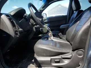 2012 Ford Escape Limited with VIN 1FMCU9EGXCKA09207, listed as a Copart auction lot 59110775 with 154,619 mi miles and Clean title. Bid and sale history available at DreamBid. Image 7.