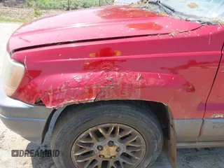 2001 Jeep Grand Cherokee Laredo z VIN 1J4GW48S11C720055, wystawiony jako IAAI lot #42453532 z przebiegiem 158 486 mil mil oraz . Historia ofert i sprzedaży dostępna na DreamBid. Obrazek 6.
