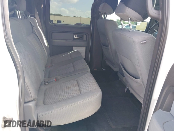 2013 Ford F-150 XL with VIN 1FTFW1ET1DFA58297, listed as a IAAI auction lot 42117924 with 202,830 mi miles and . Bid and sale history available at carsss.com. Image 8.