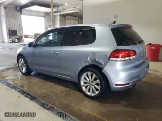 2012 Volkswagen Golf TDI w/Tech Pkg with VIN WVWMM7AJ2CW113181, listed as a Copart auction lot 52576855 with 100,589 mi miles and Salvage Title. Bid and sale history available at carsss.com. Image 2.