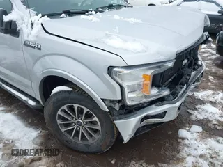 2018 Ford F-150 XL with VIN 1FTFW1E54JKC59793, listed as a IAAI auction lot 41558134 with 217,831 mi miles. Bid and sale history available at carsss.com. Image 18.