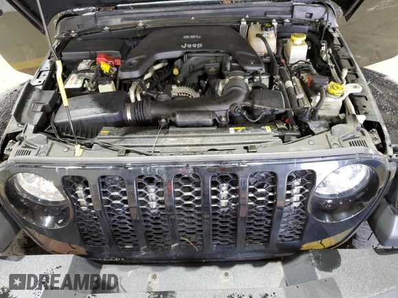 2021 Jeep Gladiator Willys with VIN 1C6HJTAG4ML556255, listed as a Copart auction lot 57143125 with 57,104 mi miles and Salvage title. Bid and sale history available at DreamBid. Image 11.