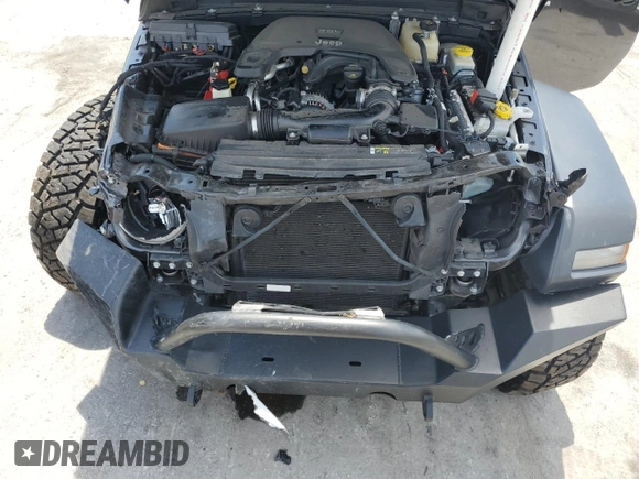 2019 Jeep Wrangler Sport S with VIN 1C4GJXAG4KW569059, listed as a Copart auction lot 60546945 with 57,131 mi miles and Non repairable. Bid and sale history available at DreamBid. Image 12.