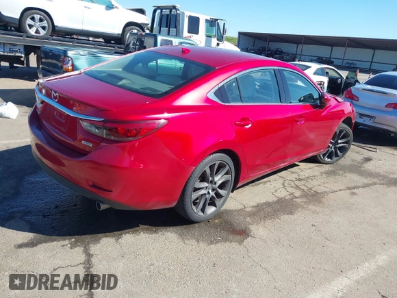 2016 Mazda 6 i Grand Touring с VIN JM1GJ1W50G1430328, выставлен на аукционе IAAI как лот 41879262 с пробегом 122 545 миль миль и . История ставок и продаж доступна на DreamBid. Изображение 4.