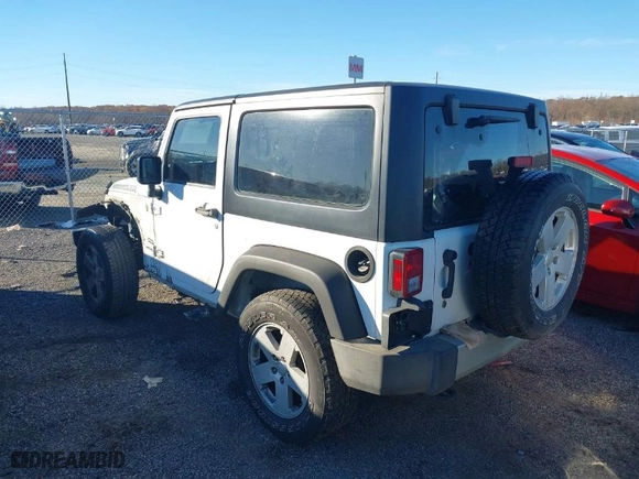 2015 Jeep Wrangler Sport with VIN 1C4AJWAG8FL511642, listed as a IAAI auction lot 40821664 with 118,501 mi miles. Bid and sale history available at carsss.com. Image 14.