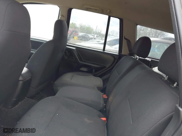 2003 Jeep Grand Cherokee Laredo with VIN 1J4GW48S63C591605, listed as a IAAI auction lot 41973681 with 177,024 mi miles. Bid and sale history available at carsss.com. Image 8.