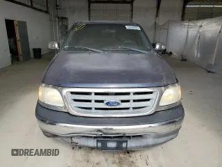 2002 Ford F-150 XL with VIN 1FTRX17W72NA16561, listed as a Copart auction lot 50938395 with 160,088 mi miles and Clean Title. Bid and sale history available at carsss.com. Image 5.