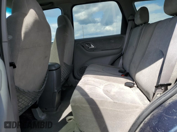 2001 Mazda Tribute LX with VIN 4F2CU08101KM29823, listed as a Copart auction lot 53857145 with 187,710 mi miles and Salvage Title. Bid and sale history available at carsss.com. Image 11.