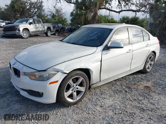 2014 BMW 3 Series 320i with VIN WBA3B1G59ENS78532, listed as a IAAI auction lot 41627172 with 133,049 mi miles. Bid and sale history available at carsss.com. Image 2.