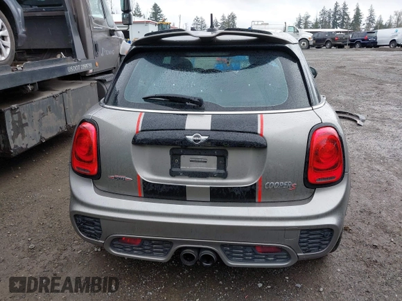 2017 MINI Hardtop 4 Door Cooper S z VIN WMWXU3C58H2D33073, wystawiony jako IAAI lot #41913081 z przebiegiem 51 631 mil mil oraz . Historia ofert i sprzedaży dostępna na DreamBid. Obrazek 17.