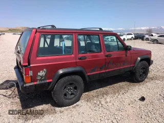 1996 Jeep Cherokee Sport with VIN 1J4FJ68S6TL171056, listed as a Copart auction lot 52099555 with 250,089 mi miles and Salvage Title. Bid and sale history available at carsss.com. Image 3.