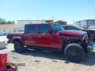 2021 Jeep Gladiator Freedom with VIN 1C6HJTAG2ML549434, listed as a IAAI auction lot 42059434 with 29,041 mi miles and . Bid and sale history available at DreamBid. Image 14.