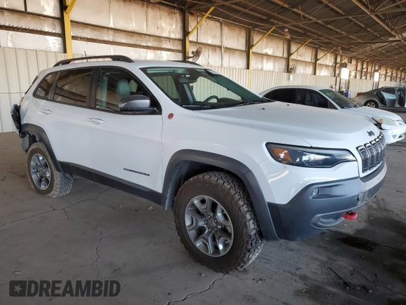 2019 Jeep Cherokee Trailhawk Elite with VIN 1C4PJMBX0KD314515, listed as a Copart auction lot 86926364 with 89,422 mi miles and Salvage Title. Bid and sale history available at carsss.com. Image 4.