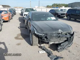 2023 Cadillac CT5 Luxury z VIN 1G6DW5RK4P0156637, wystawiony jako IAAI lot #41838276 z przebiegiem 49 489 mil mil oraz . Historia ofert i sprzedaży dostępna na DreamBid. Obrazek 1.