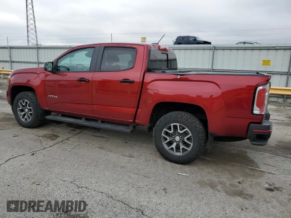 2021 GMC Canyon 4WD AT4 w/Cloth with VIN 1GTG6FENXM1185842, listed as a Copart auction lot 52574755 with 47,322 mi miles and Salvage Title. Bid and sale history available at carsss.com. Image 2.