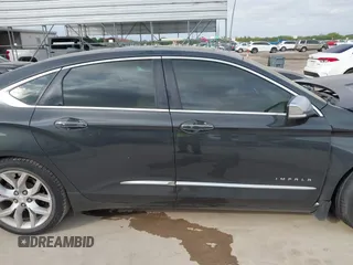 2014 Chevrolet Impala LTZ with VIN 2G1155S31E9101628, listed as a IAAI auction lot 42064481 with 148,511 mi miles and . Bid and sale history available at DreamBid. Image 12.