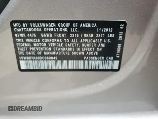 2013 Volkswagen Passat SE with VIN 1VWBH7A33DC069849, listed as a Copart auction lot 60709075 with 217,320 mi miles and Salvage title. Bid and sale history available at DreamBid. Image 12.