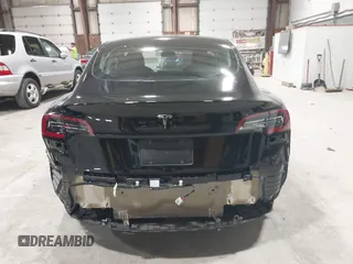2023 Tesla Model 3 with VIN 5YJ3E1EA5PF552241, listed as a IAAI auction lot 41876487 with 18,533 mi miles and . Bid and sale history available at carsss.com. Image 16.