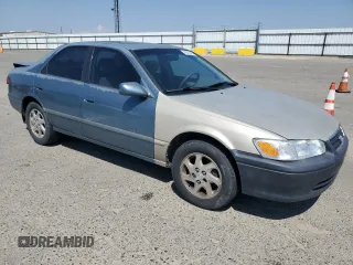 2000 Toyota Camry CE with VIN JT2BG22K9Y0521639, listed as a Copart auction lot 55075485 with 248,460 mi miles and Salvage Title. Bid and sale history available at carsss.com. Image 4.