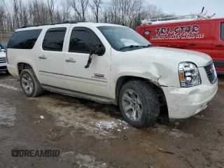 2011 GMC Yukon XL SLT with VIN 1GKS1KE06BR217663, listed as a Copart auction lot 43960245 with 215,703 mi miles and Salvage Title. Bid and sale history available at carsss.com. Image 4.