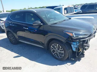 2021 Hyundai Tucson Limited with VIN KM8J33AL9MU305948, listed as a IAAI auction lot 41834956 with 100,098 mi miles. Bid and sale history available at carsss.com. Image 1.
