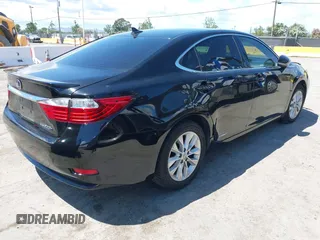 2013 Lexus ES 300h with VIN JTHBW1GG1D2034392, listed as a IAAI auction lot 42236596 with 207,830 mi miles and . Bid and sale history available at DreamBid. Image 4.